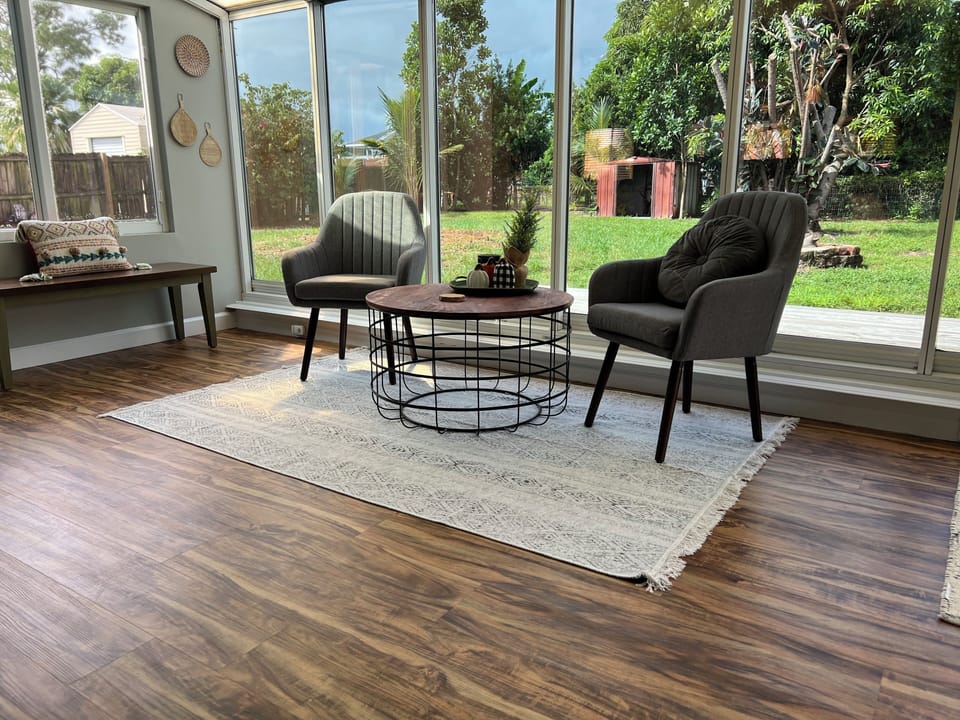 Bright sunroom perfect for coffee, reading, or relaxing in the sunshine.