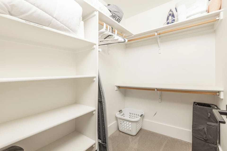 Master Bedroom Closet With Pack-N-Play, Highchair, And Queen Size Air Mattress