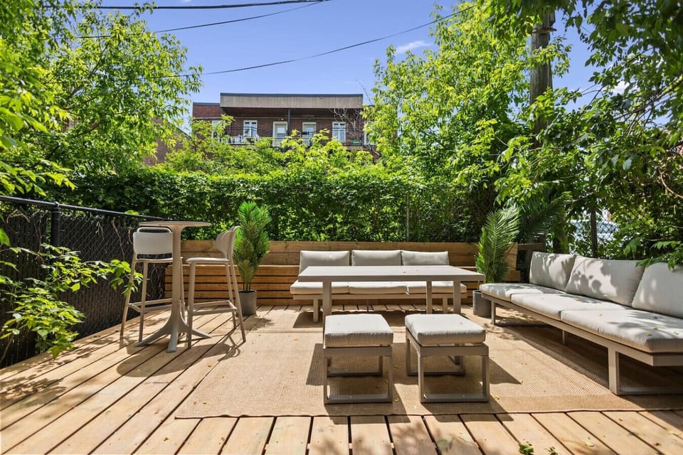 Tranquil outdoor patio surrounded by lush greenery