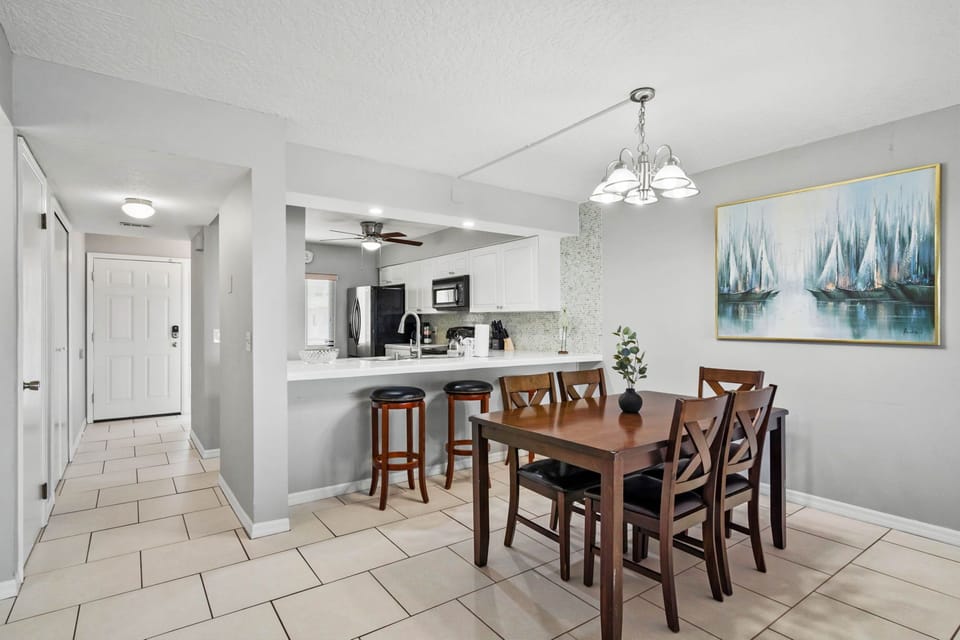 Dining table that can seat for four and counter with high chair