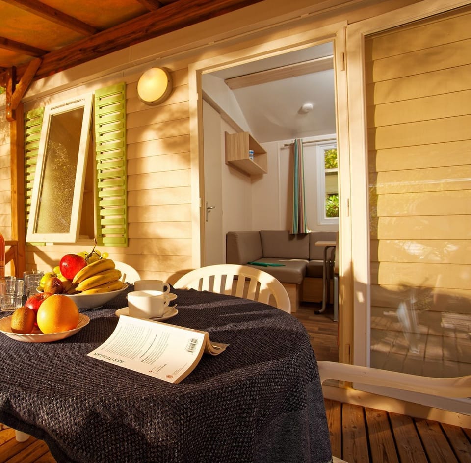 Dine al fresco on the private terrace equipped with outdoor furniture.