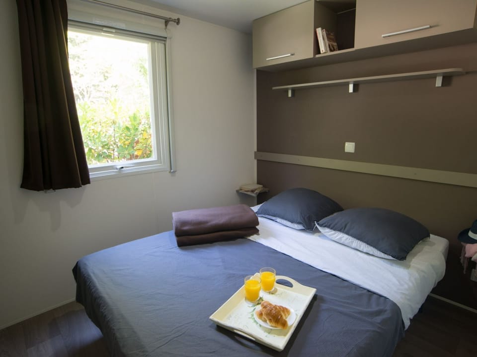 Enjoy a peaceful night in the spacious bedroom featuring a double bed and cosy ambiance.