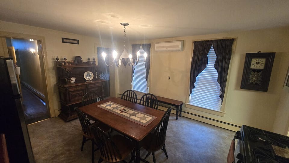 Kitchen table comfortably sits 6