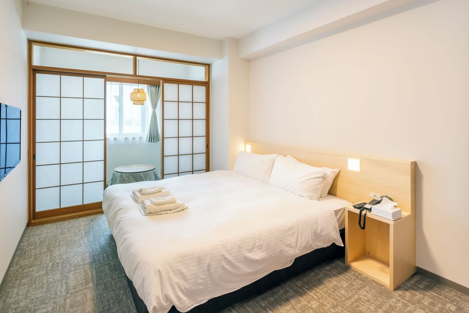 Superior One-Bed Room Apartment, Non Smoking | Down comforters, in-room safe, blackout drapes, soundproofing