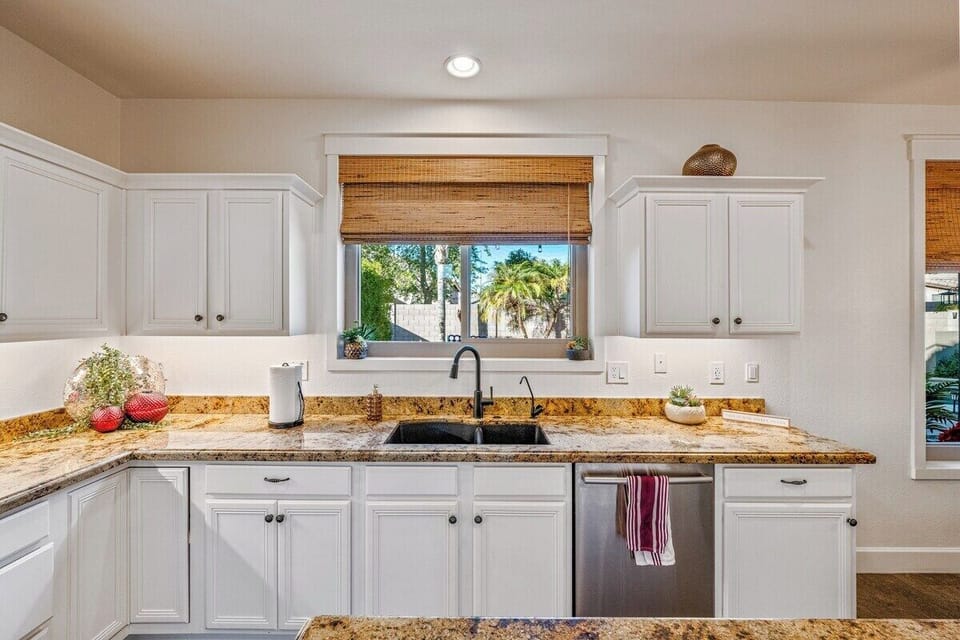 Never complain washing dishes at this sink - staring at the backyard.