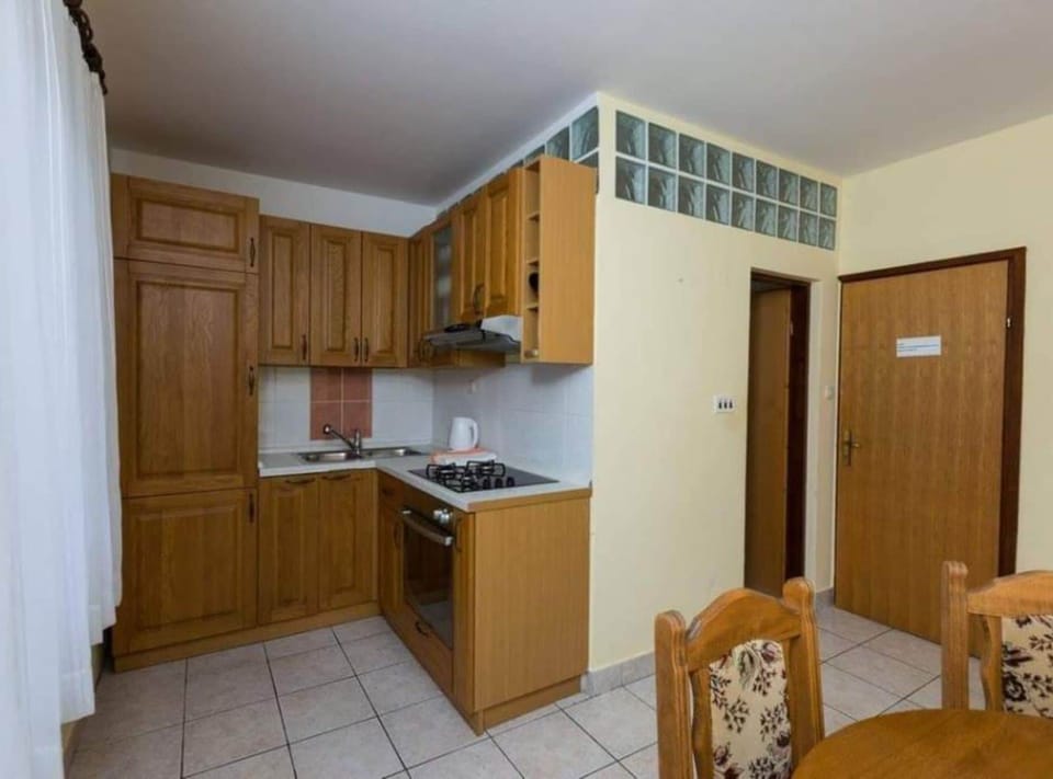 Apartment (Four Bedroom Apartment) | Private kitchen | Fridge