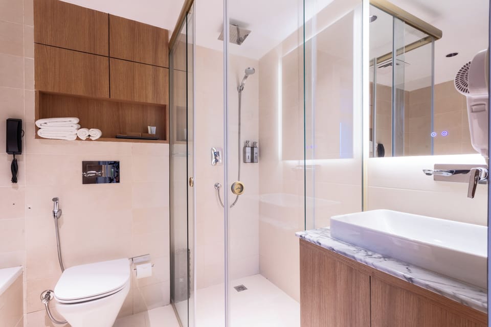 Suite Room | Bathroom | Hair dryer, bathrobes, slippers, bidet