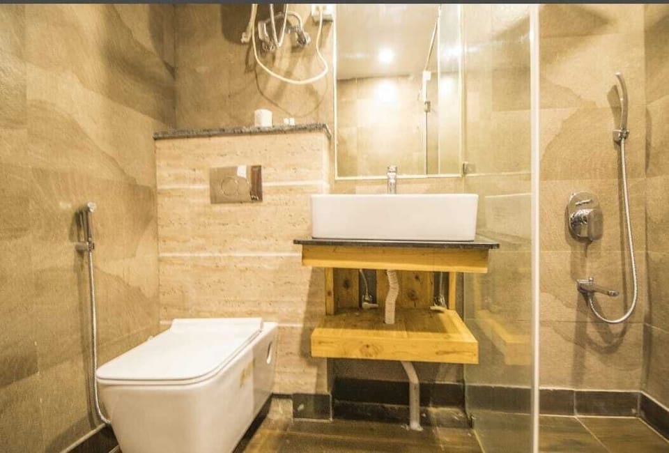 Family Suite, Mountain View | Bathroom | Combined shower/tub, hair dryer, slippers, towels