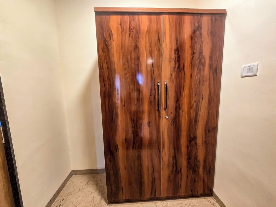 Deluxe Double Room | Living area | TV