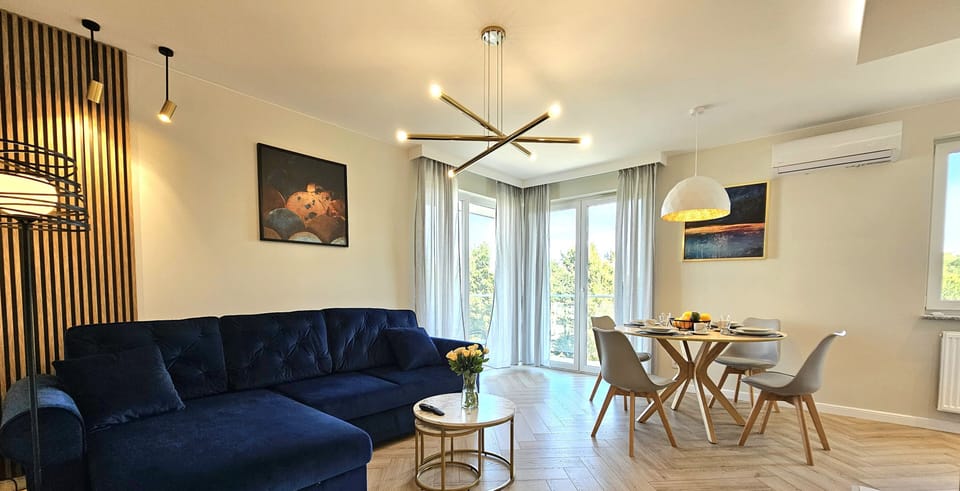 Comfort Apartment, Balcony, Park View | Living area | 50-inch LCD TV with cable channels