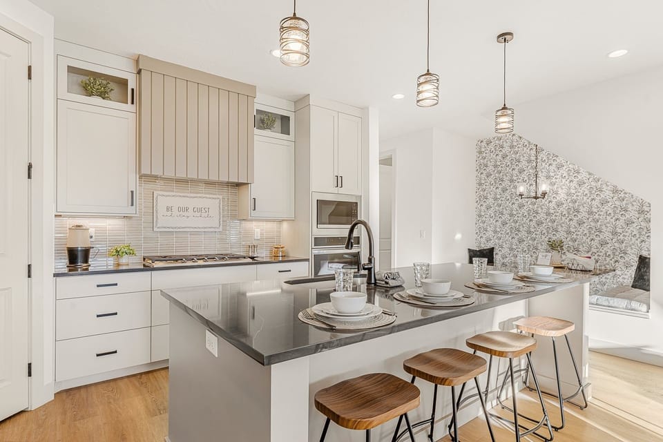 Townhome, 4 Bedrooms | Private kitchen | Fridge, oven, coffee/tea maker, electric kettle