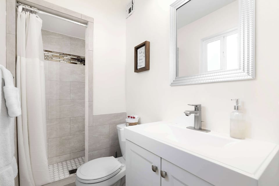 Start your day in this sparkling clean and modern bathroom