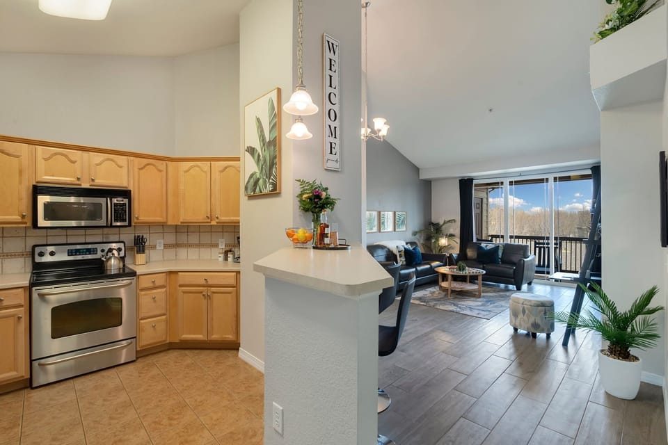 Kitchen and Dining Area with Vaulted Ceilings