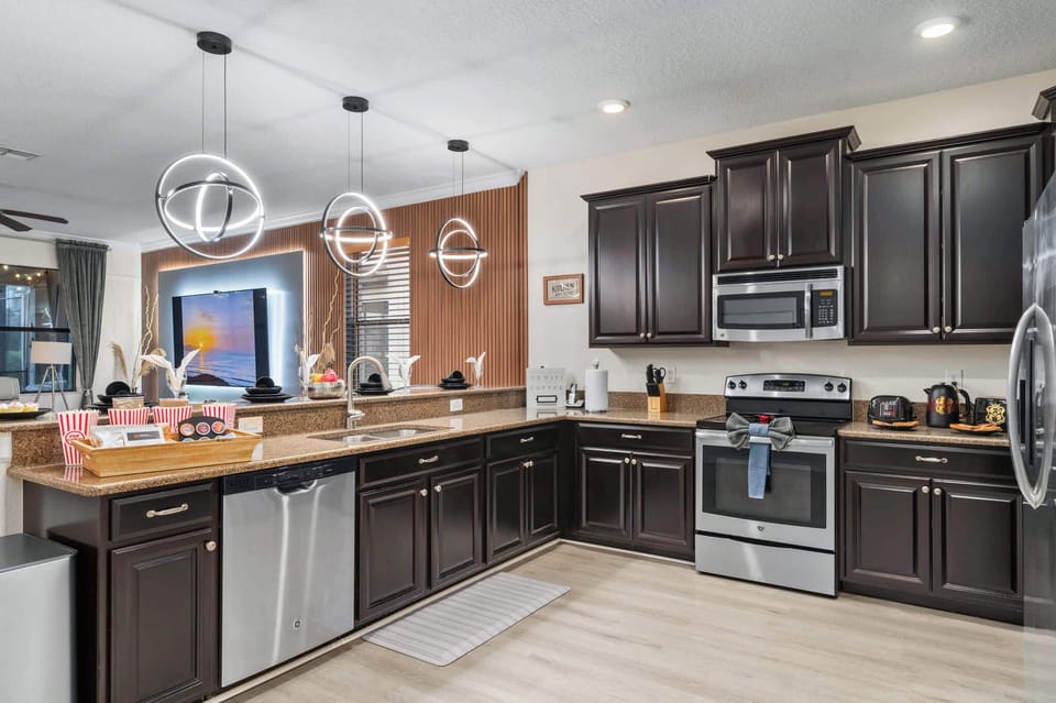 Large kitchen with all major appliances, drip coffee and Keurig, blender, water kettle and all cooking and dining ware. 