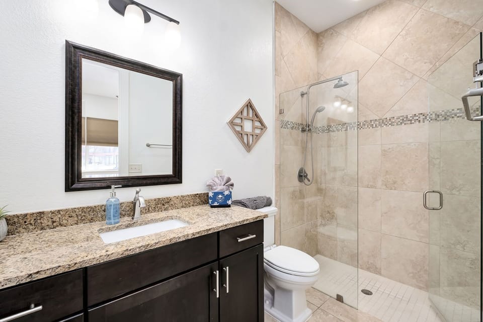 Private Bathroom #1 has a walk-in shower for Bedroom #1.
