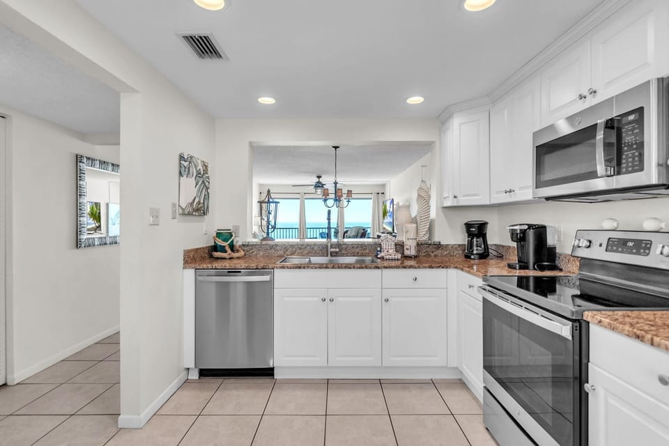 Condo, Multiple Beds (Ocean Sands 1-1002) | Private kitchen | Oven, toaster