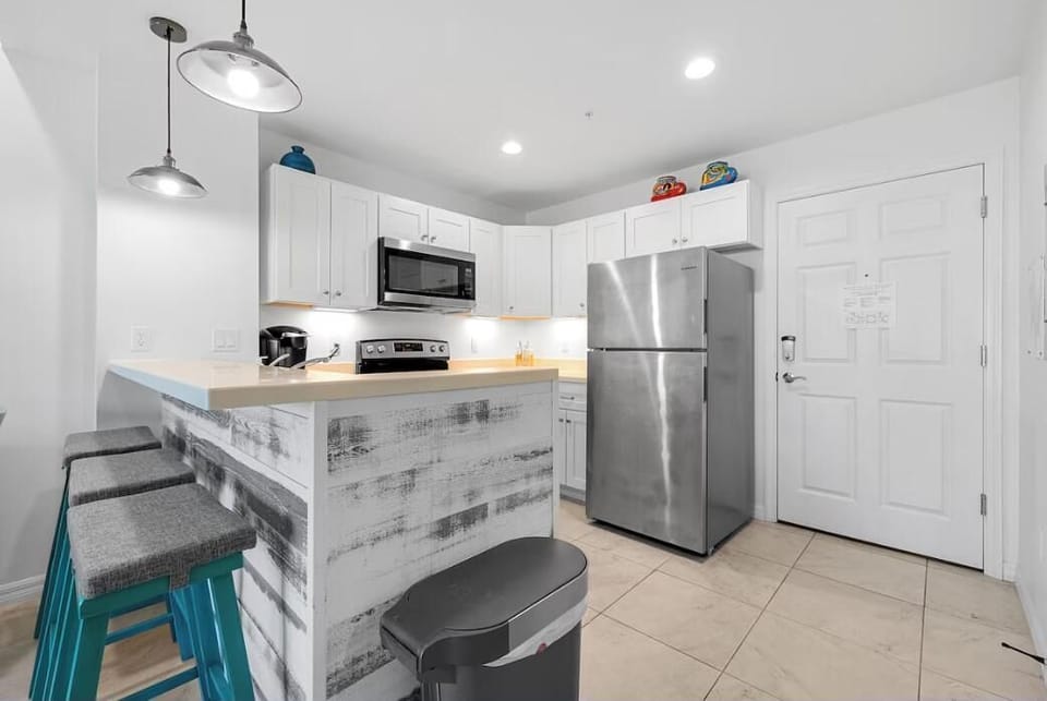 Condo, 1 King Bed with Sofa bed (Madeira Bay Resort I 1402) | Private kitchen | Oven, toaster