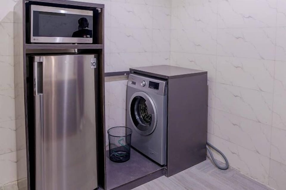 Economy Apartment, Balcony, City View | Private kitchen | Fridge, microwave, oven, stovetop