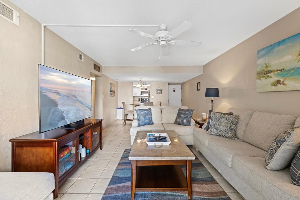 Condo, Multiple Beds (Castle Reef 314) | Living area | TV