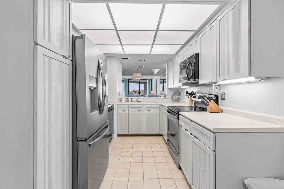 Condo, Multiple Beds (Ebb Tide 202) | Private kitchen | Oven, coffee/tea maker, toaster, blender