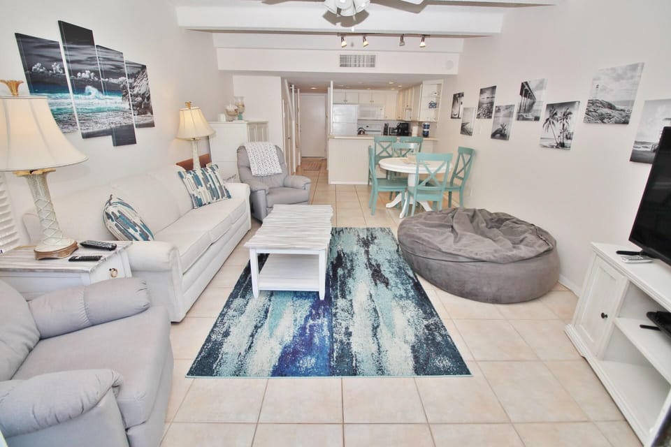 Condo, Multiple Beds (Ocean Club North C208) | Living area | TV