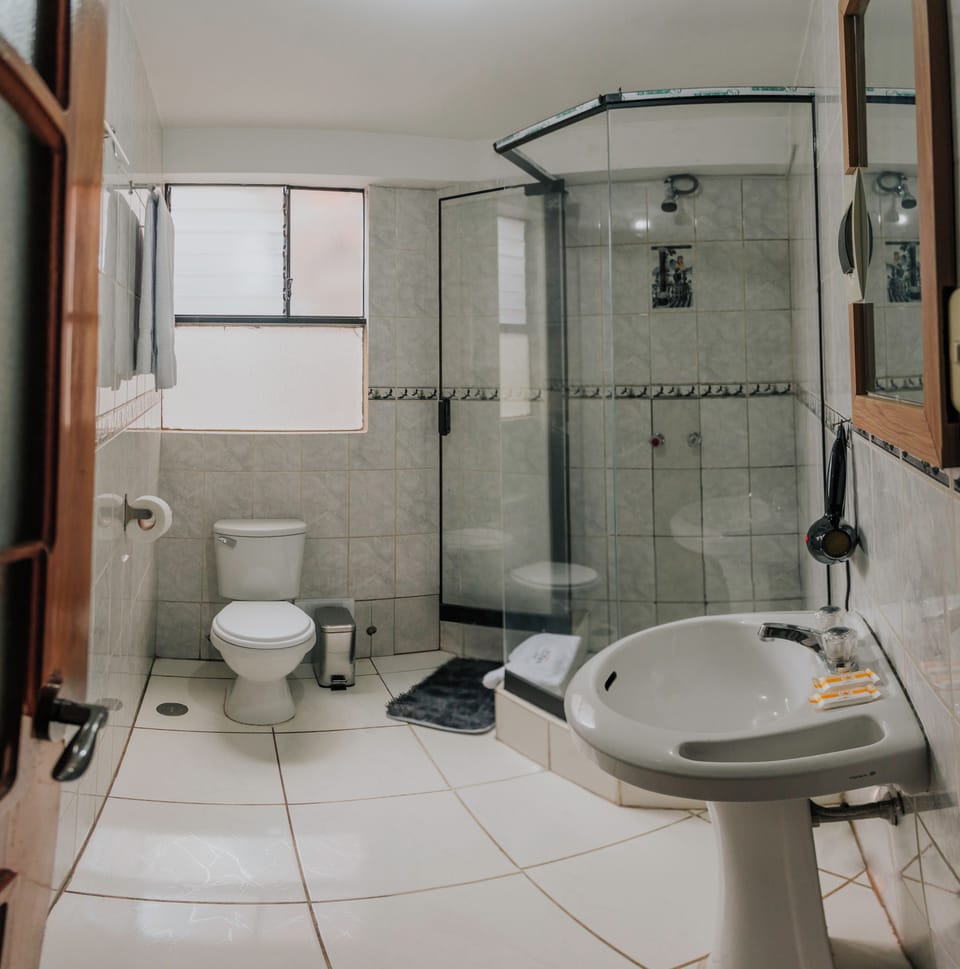 Comfort Triple Room | Bathroom | Shower, rainfall showerhead, hair dryer, bathrobes