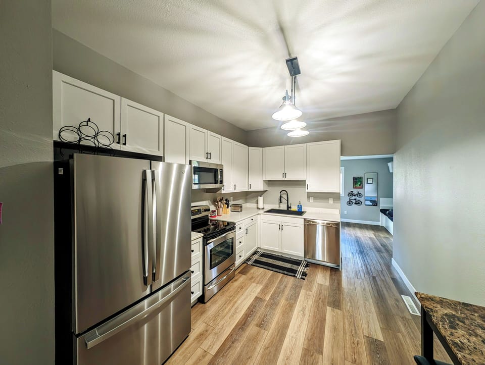 Modern stainless steel appliances make cooking easy. 
