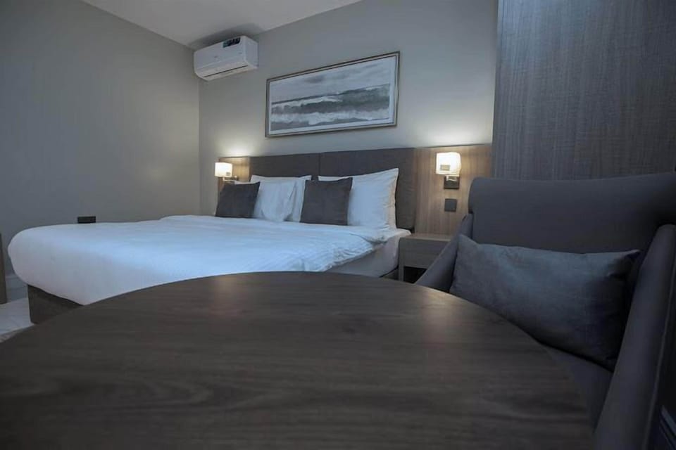Family Apartment, Balcony, City View | 1 bedroom, desk, laptop workspace, blackout drapes