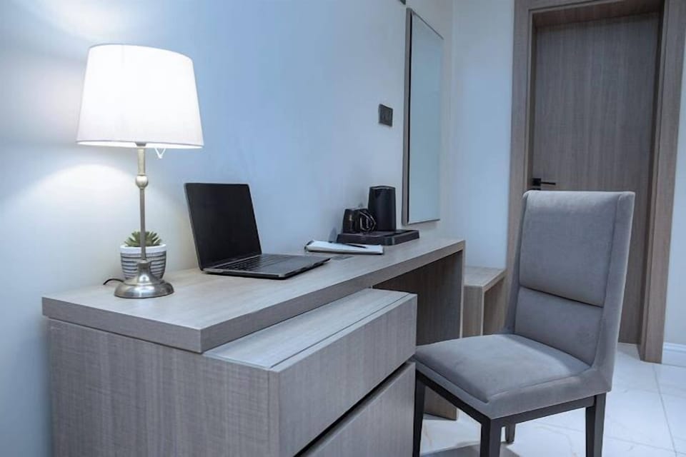 Family Apartment, Balcony, City View | 1 bedroom, desk, laptop workspace, blackout drapes