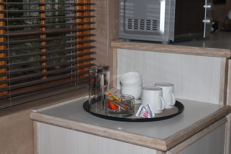 Double or Twin Room, Garden View | Blackout drapes, iron/ironing board (on request), WiFi (free)