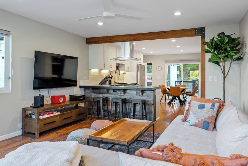 From the cozy media nook to the inviting breakfast bar and sunlit dining area, every detail is designed for comfort and style.