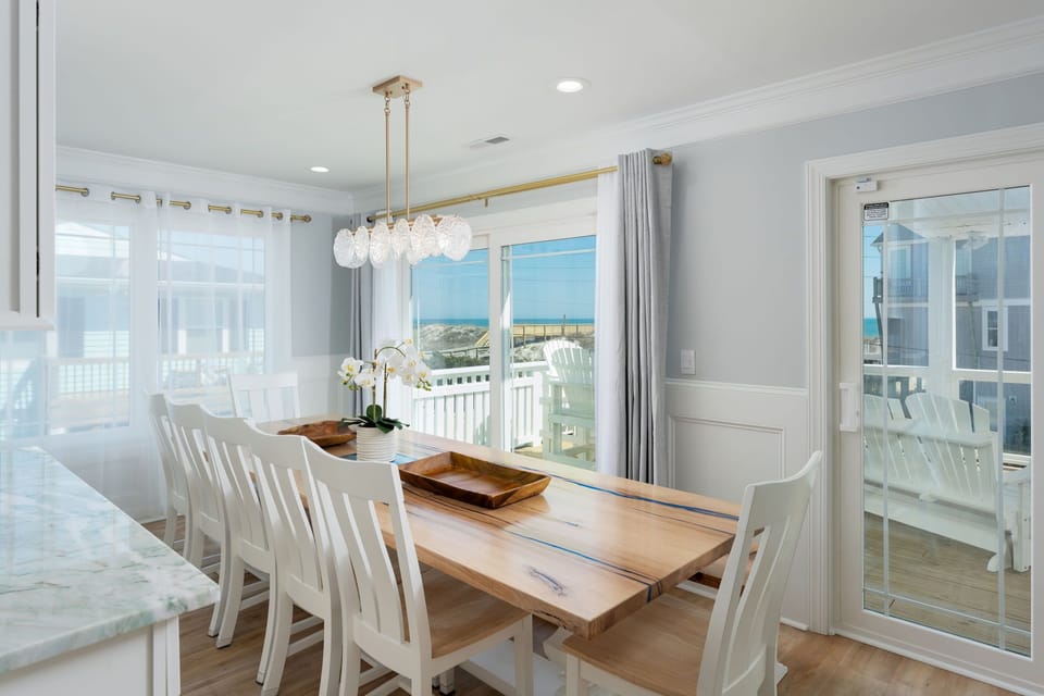 Custom natural oak table with resin and gorgeous ocean views
