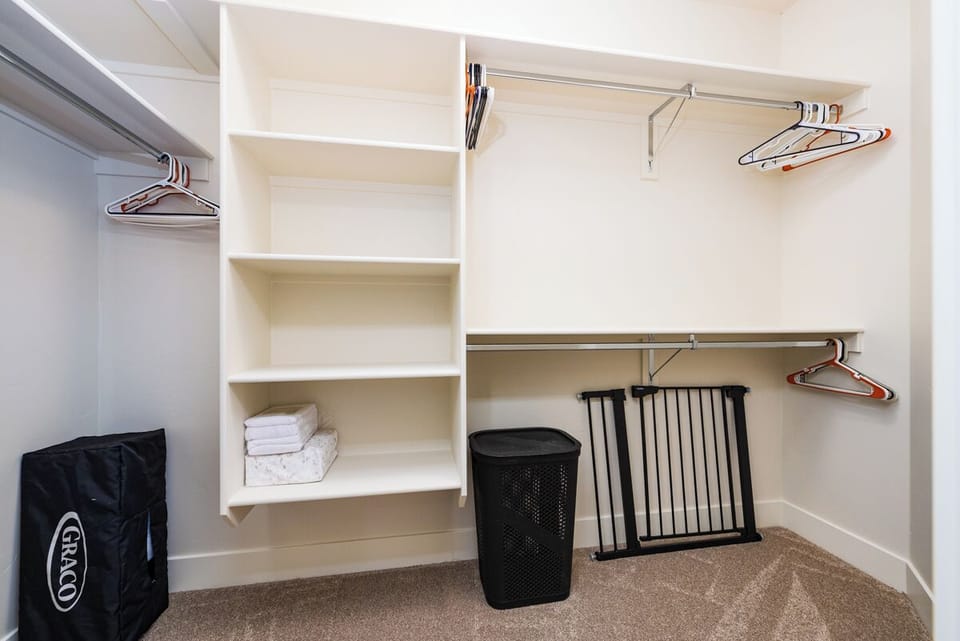 Keep your wardrobe organized in this roomy walk-in close