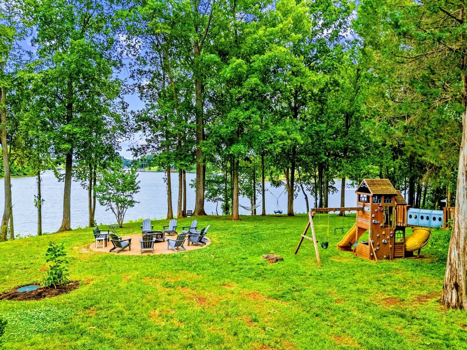 The wooded, waterfront lot offers privacy and easy access to the shoreline.