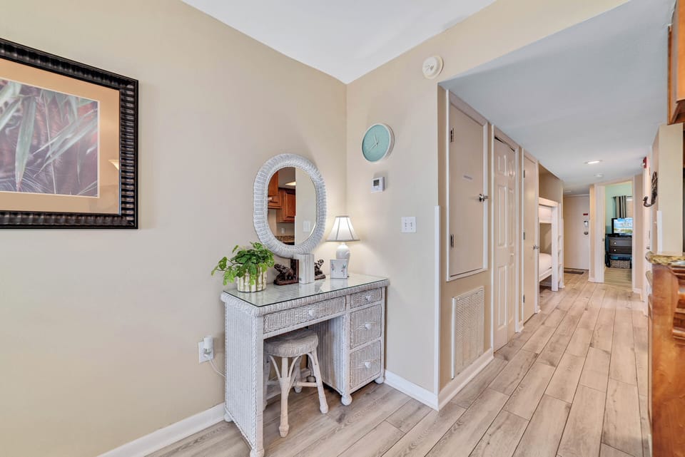 Desk with stool for additional flex space at Gulf Shores condo.