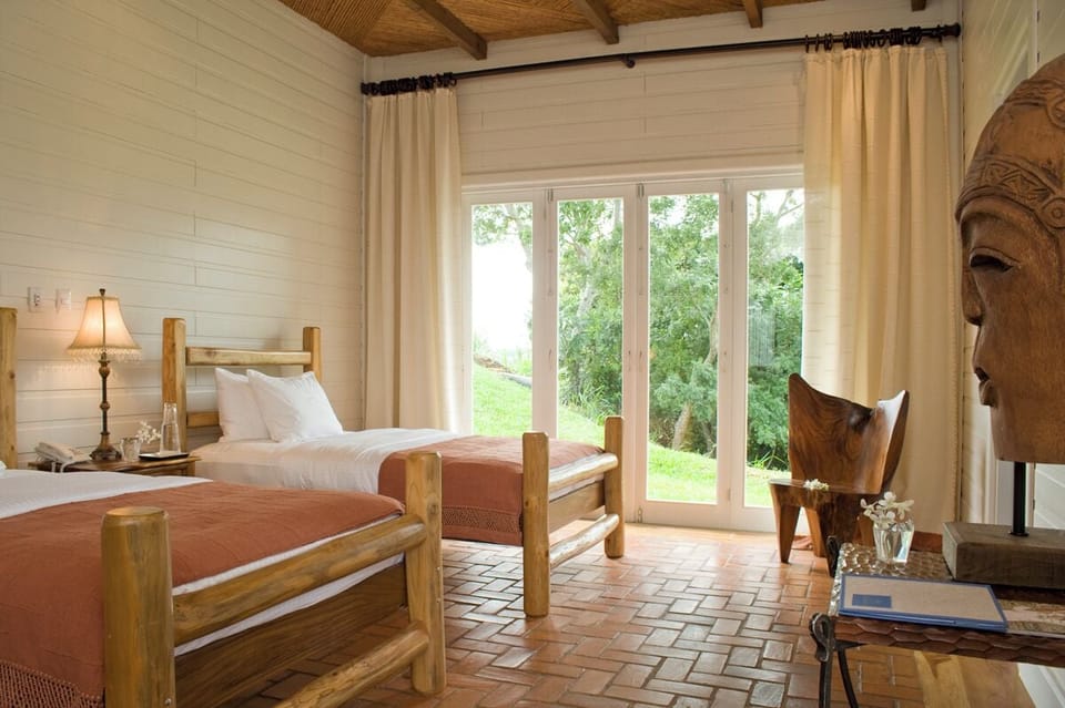 In-room safe, desk, laptop workspace, bed sheets