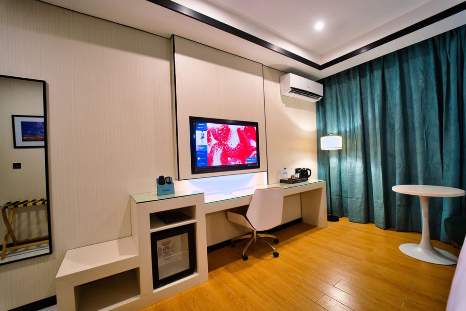 Superior Suite, City View | 1 bedroom, desk, laptop workspace, free WiFi