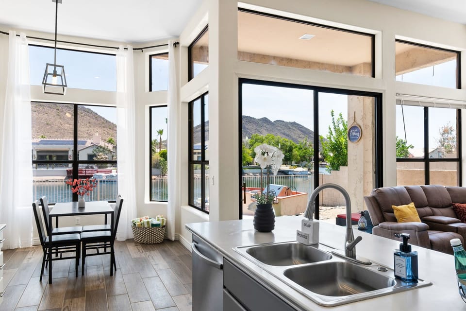 Enjoy stunning lake and mountain views from the kitchen and dining area