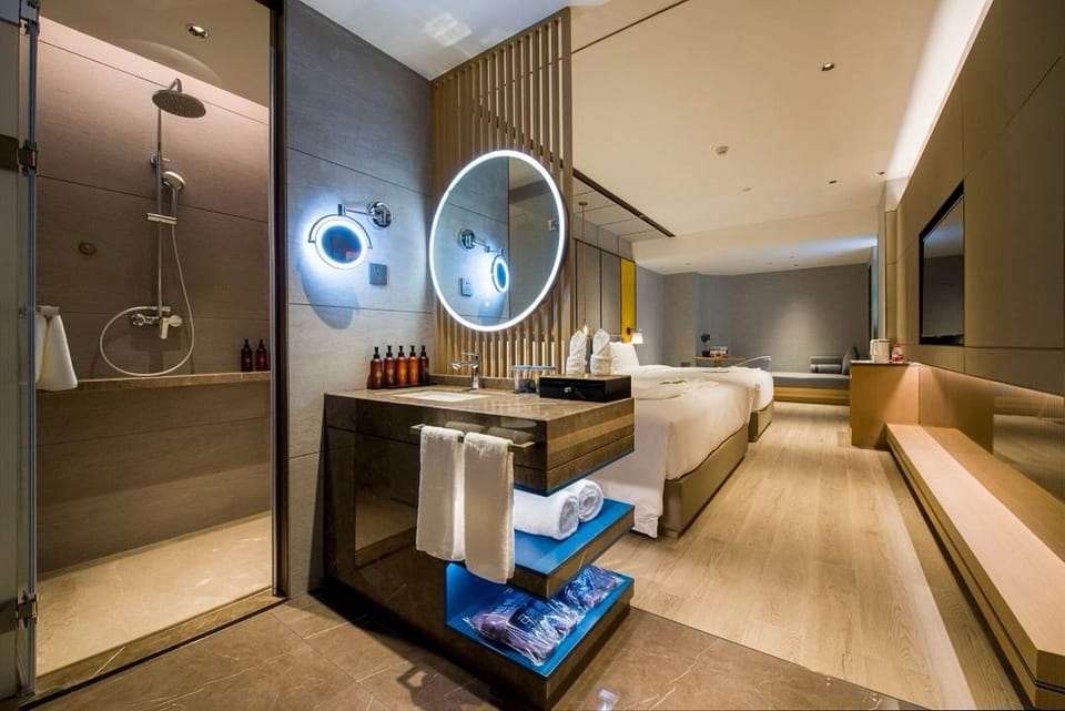 Family Twin Room, City View | Bathroom | Shower, rainfall showerhead, free toiletries, hair dryer
