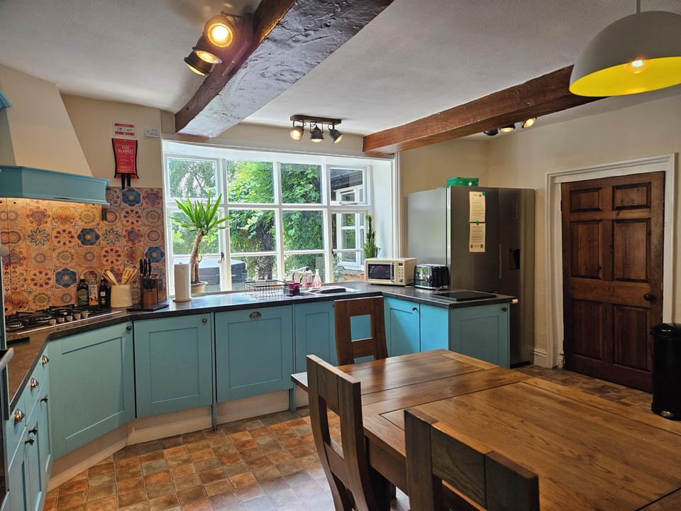 Fully equipped kitchen and 10 seater oak table