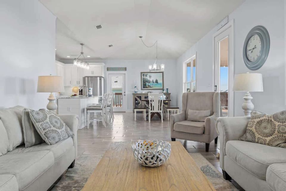 Relax in style! This cozy seating area features a comfy love seat and a queen-size sofa bed—perfect for lounging and movie nights with the TV #CozyVibes #RelaxAndUnwind
