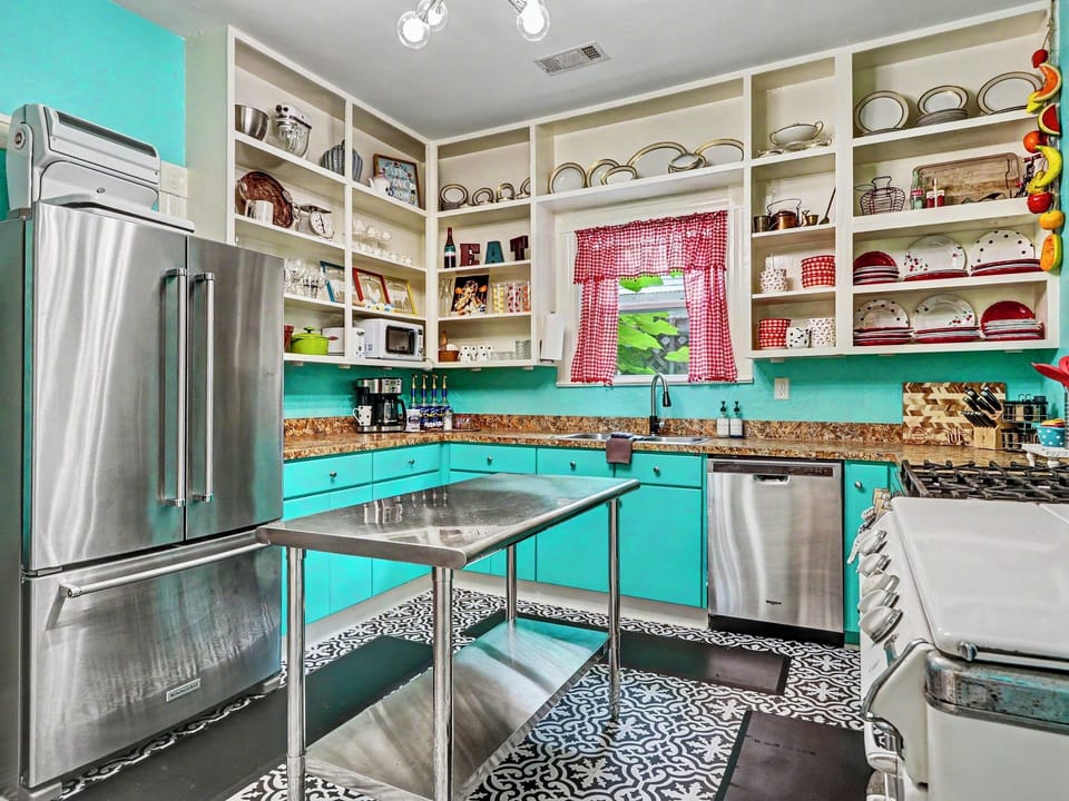 Fully equipped kitchen with vintage charm and modern convenience.