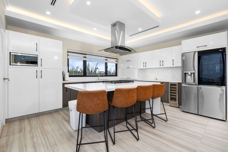 Whip up meals in style—this modern kitchen is fully equipped and perfect for everything from quick breakfasts to sunset dinner parties.