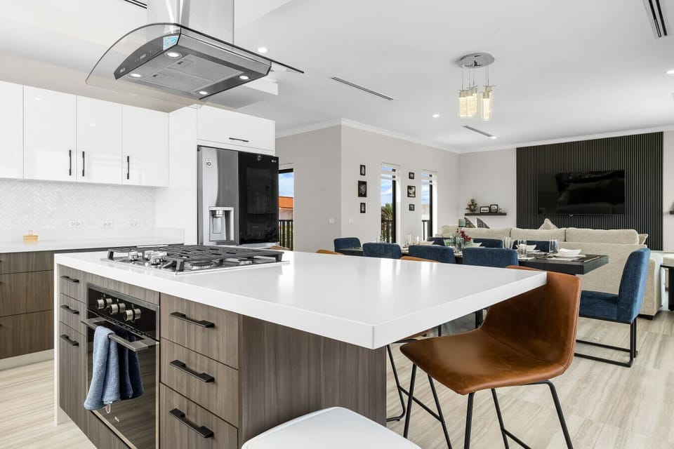 Cook, dine, and unwind—all in one inviting space. This open-concept layout keeps everyone connected from kitchen to couch.