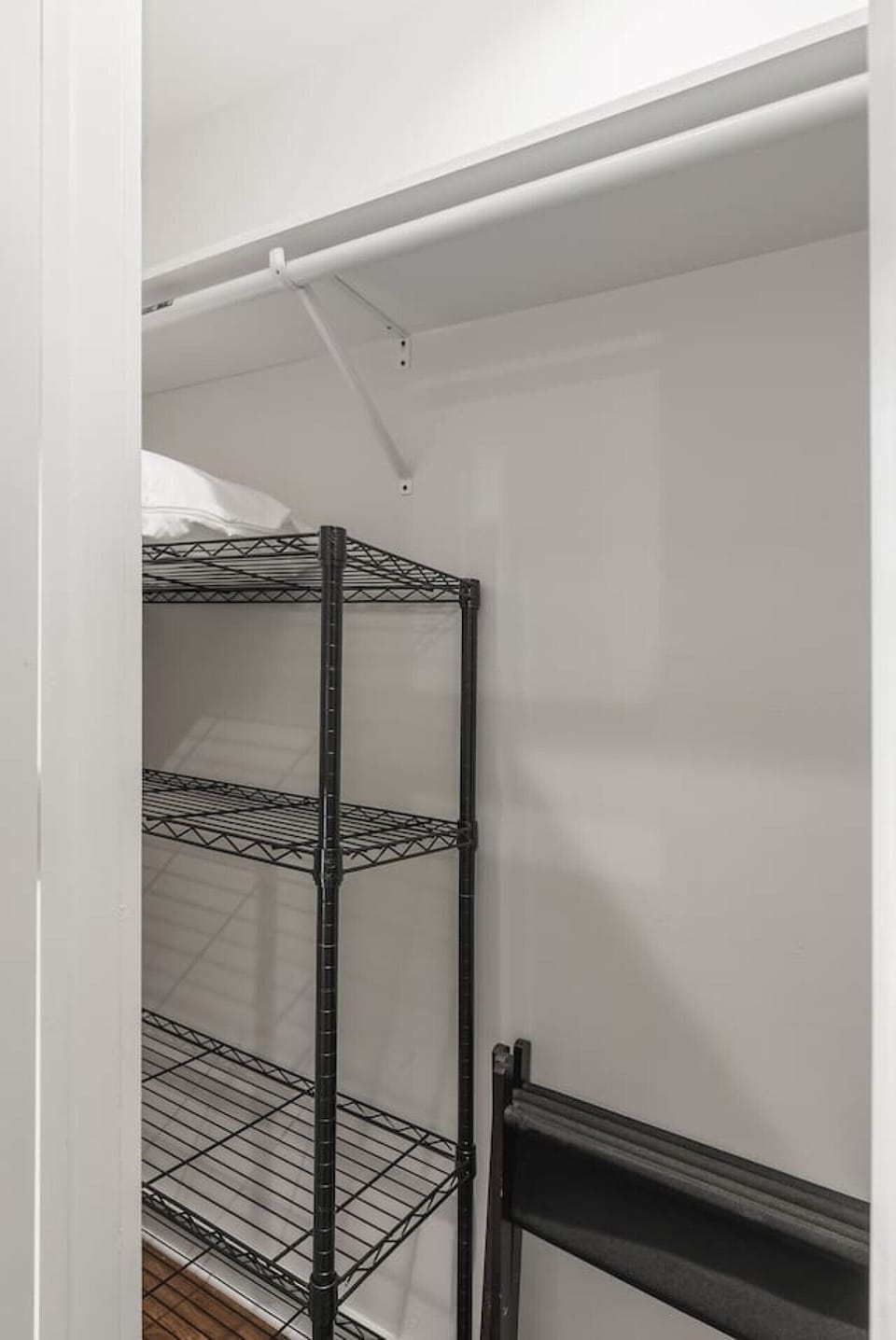 Two twin bunkbeds in the Bedroom. Closet with hangers and shelf, Dresser and Nightstands to store your items in + Darts game board.