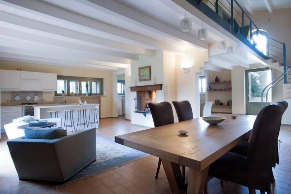Villa | Living area | Flat-screen TV, fireplace