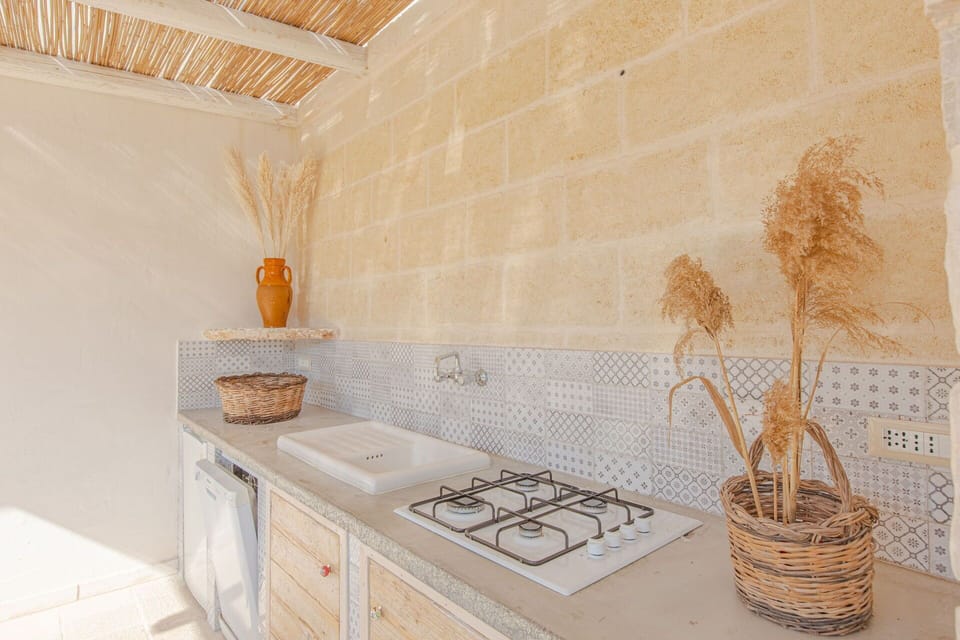 Flooring, Floor, Tile, Natural Material, Countertop, Wood Stain, Marble, Limestone, Plumbing Fixture