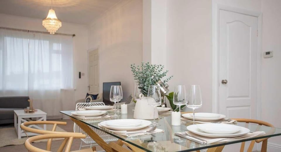 Elegant dining setup featuring natural tones and soft ambient lighting.
