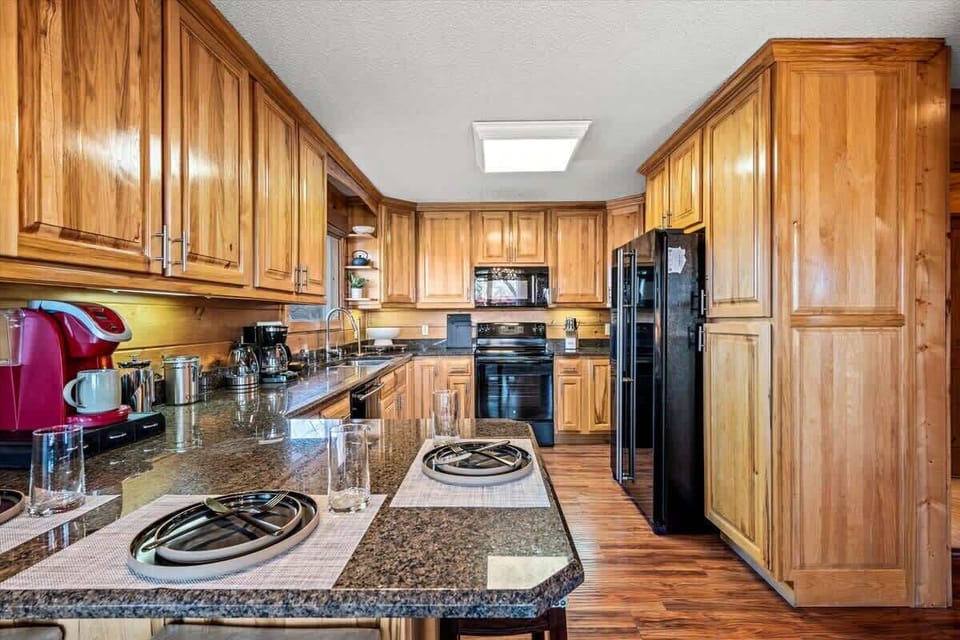 Start your day with a fresh brew and a mountain view from this charming kitchen nook.