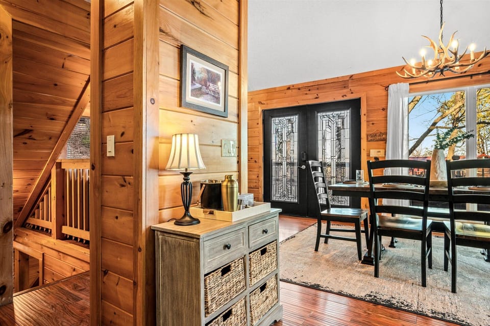 A cozy welcome awaits you with rustic charm and soft lighting from the moment you enter.